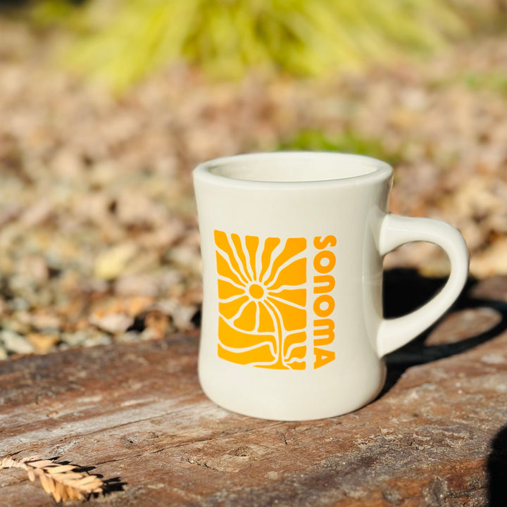 Reminisce the good old diner days with this delightful Diner Mug "Golden Sunflower". Perfect for hot drinks; its thick walls and heavyweight design keeps them steaming hot for hours! Add some sunshine into your mug collection!