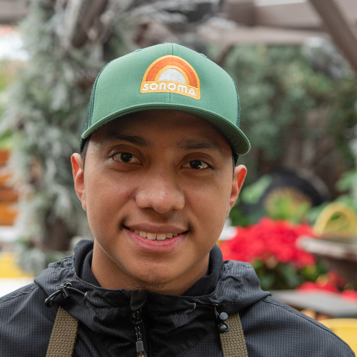 Bold and Bright Trucker Caps for Anyone: These plain 6-panel Flexfit caps sport a mid-profile structure with mesh side and back panels for breathability and an elastic band for all sizes in a cool Evergreen shade Unisex Caps with Sun Shield: These versatile snapback caps for anyone come with a sturdy curved visor and a matching under-brim for added style and protection Premium Craftsmanship: Made of 65% Polyester and 35% Cotton, this trucker hat is durable and perfect for all your team sports needs Cap Care