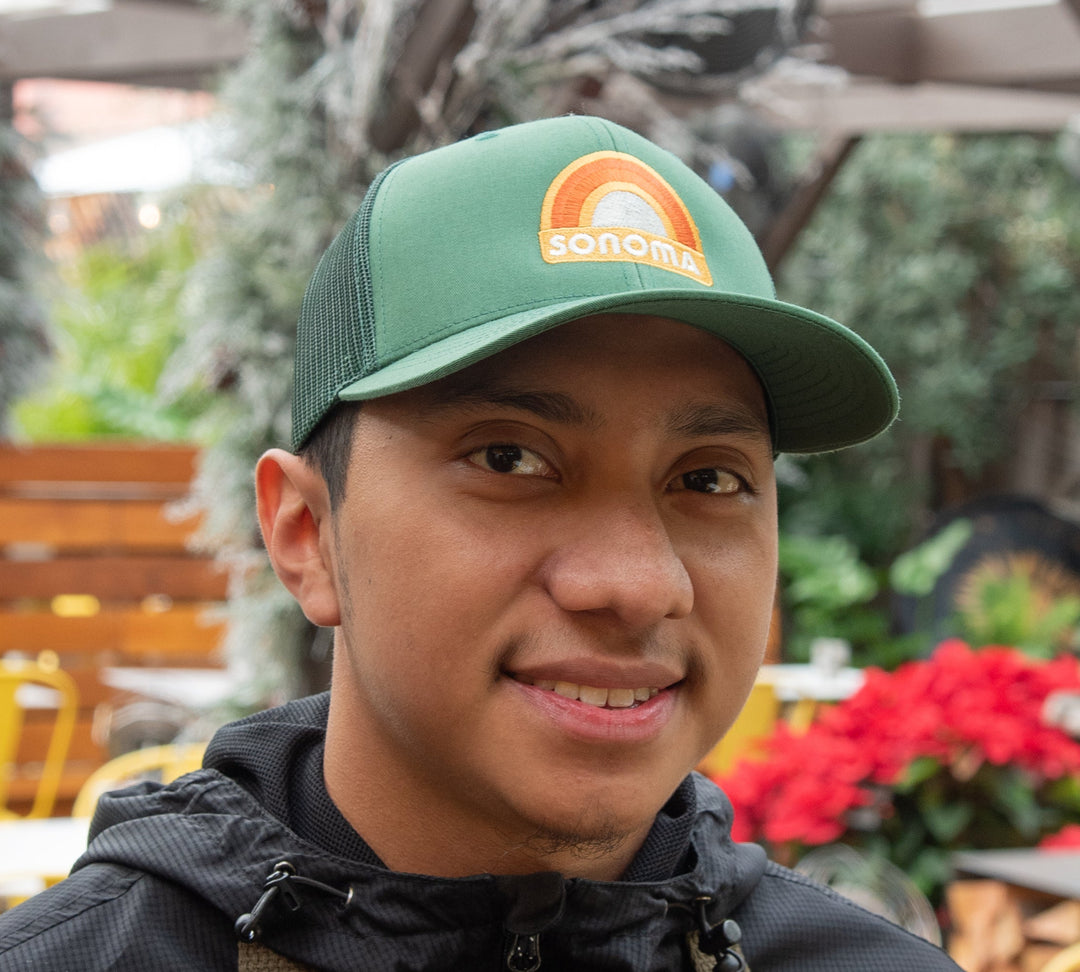 Bold and Bright Trucker Caps for Anyone: These plain 6-panel Flexfit caps sport a mid-profile structure with mesh side and back panels for breathability and an elastic band for all sizes in a cool Evergreen shade Unisex Caps with Sun Shield: These versatile snapback caps for anyone come with a sturdy curved visor and a matching under-brim for added style and protection Premium Craftsmanship: Made of 65% Polyester and 35% Cotton, this trucker hat is durable and perfect for all your team sports needs Cap Care