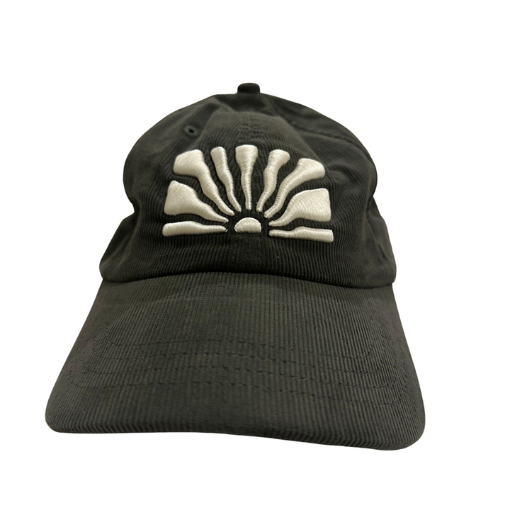 Our most classic expression.

This vintage olive corduroy hat features the PUFF embroidered Sunflower sunrise emblem on the front with Sunflower Caffè stitched on the back.

Designed to be worn daily and loved over time, this is the hat you’ll keep reaching for — season after season.

Soft corduroy fabric
Embroidered Sunflower sunrise emblem
“Sunflower Caffè” embroidery on back
Adjustable strap closure
One size fits most
Color: Olive / Charcoal